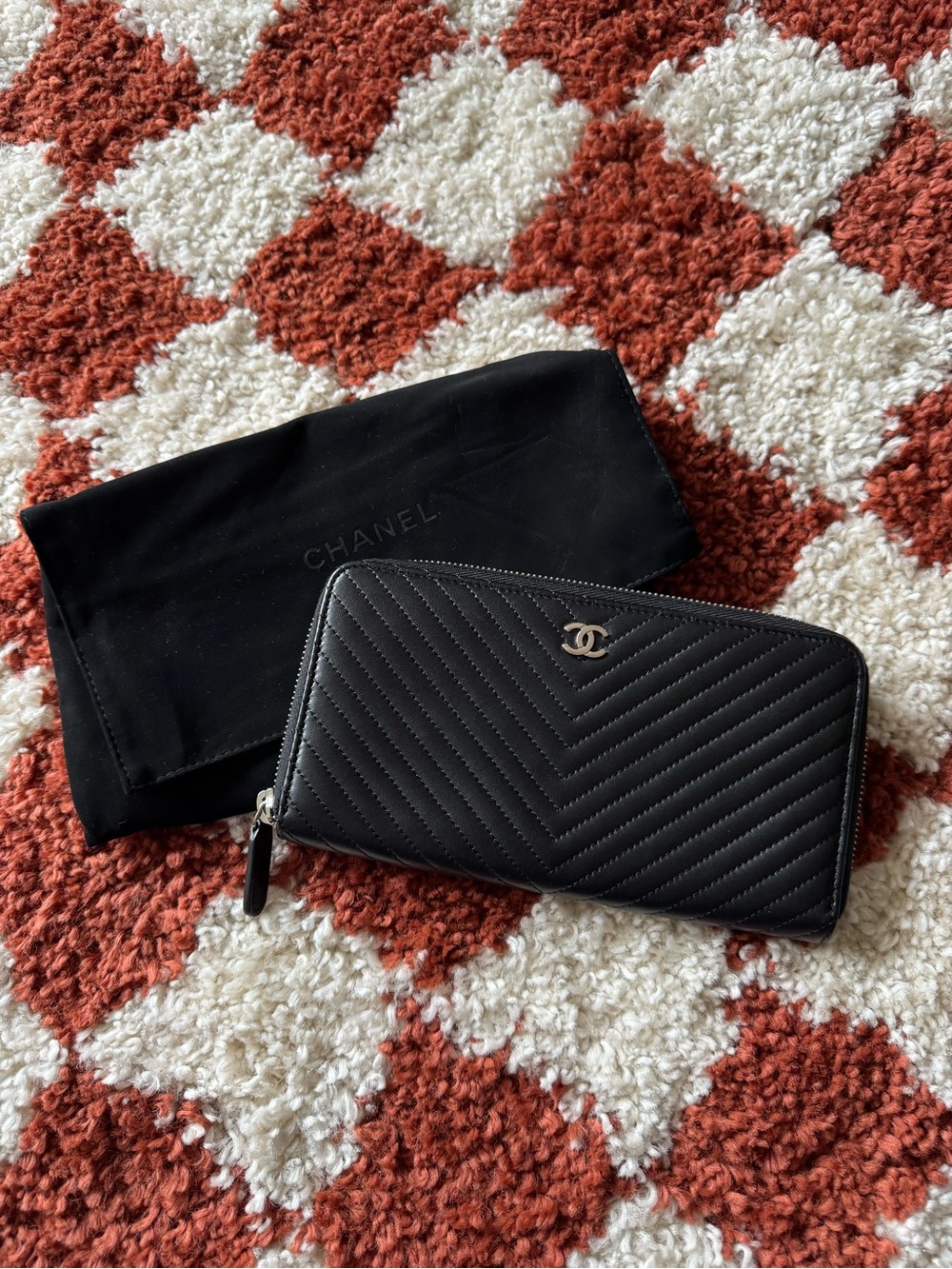 Chanel black chevron stitched lambskin zip around wallet